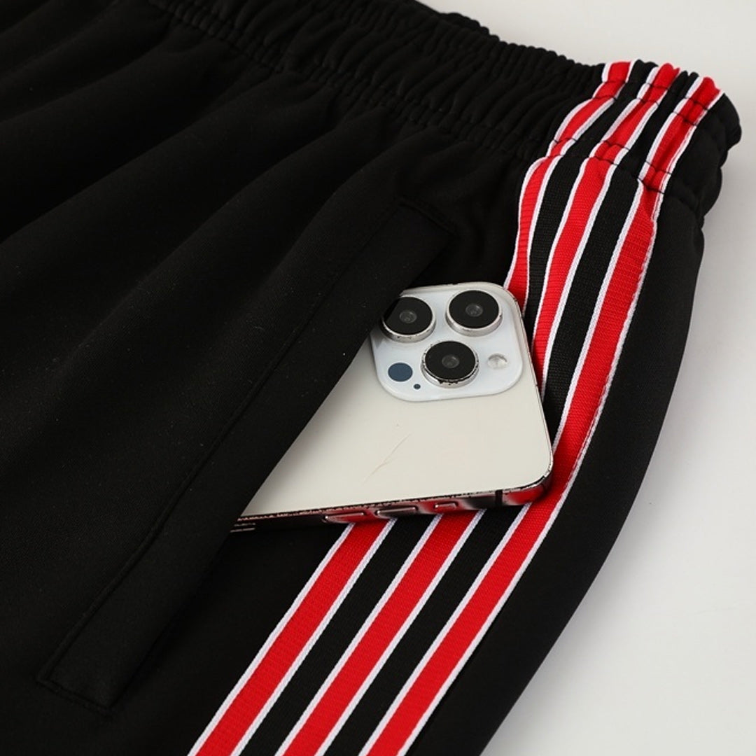 Męski dres treningowy Manchester United 2025/26 czerwono-czarny