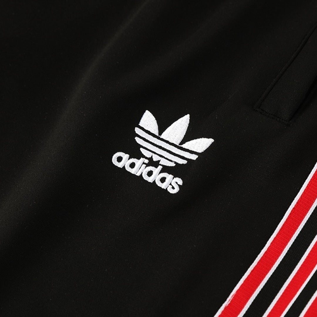 Męski dres treningowy Manchester United 2025/26 czerwono-czarny